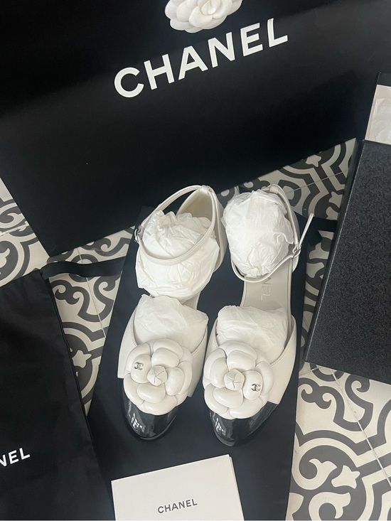 CHANEL Shoes - NEW CHANEL White Leather Camellia Mary Jane Mules with Black Cap Toe